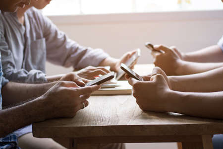 group of man use phone to contact and connect about business, concept as internet , and social network.の写真素材