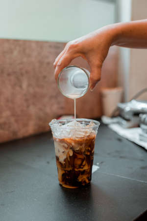 glass of coffee with milk on the table