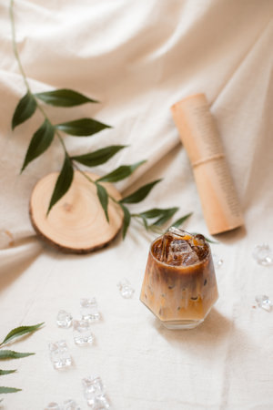 Close-up of iced coffee served on black table at cafeâ€‹