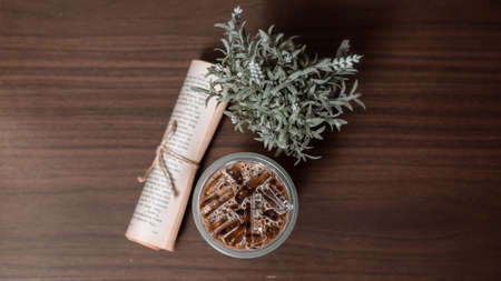 glass of coffee with milk on the tableの写真素材