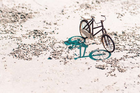 wooden bicycle toy handicraft at the beach o beautiful nature background