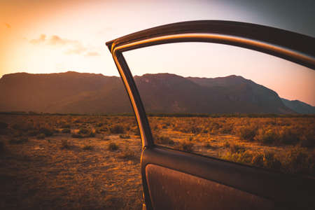 in car. Summer vacation and travel, romantic road trip mountain st sunset beautiful landscapeの写真素材