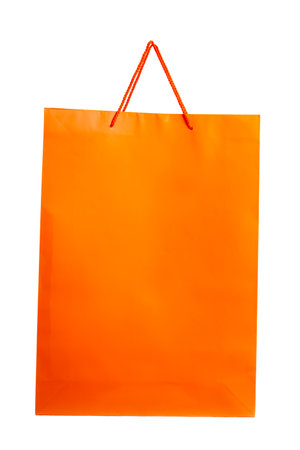 Orange paper bag isolated on white. Front angle.の写真素材