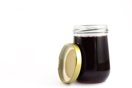 Grape jam isolated on white background.の写真素材