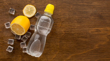 Plastic bottle water lemon top viewの写真素材