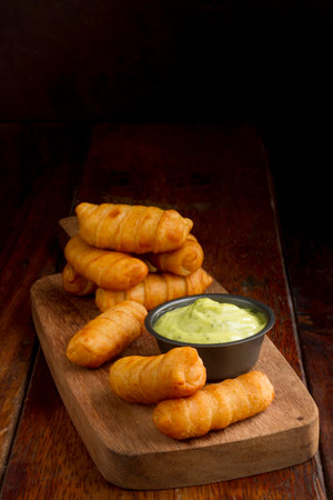 Traditional venezuelan cheese sticks composition