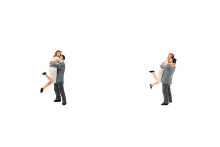 Miniature couple huggingの写真素材