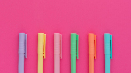 Flat lay children desks still life. Arrangement with colorful itemsの写真素材