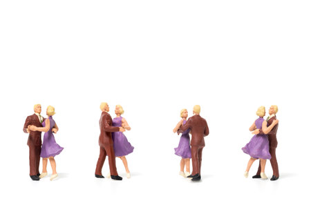 Miniature people, Couple romantic dancing on white background