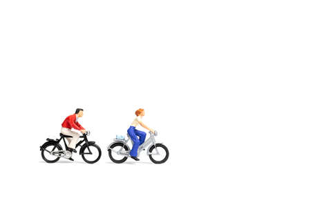 Miniature people : Couple ride bicycle on white background ,の写真素材