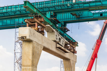 Construction of mass rail transit line in progress, construction bridge crossingの写真素材
