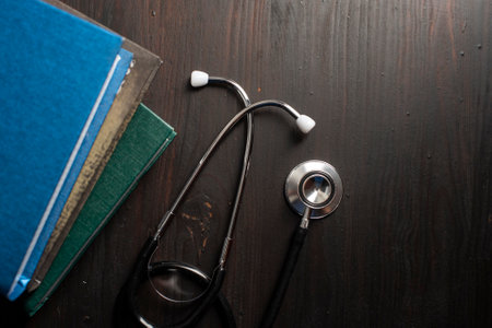 Close-up Of Medical Stethoscope On desk with booksの写真素材