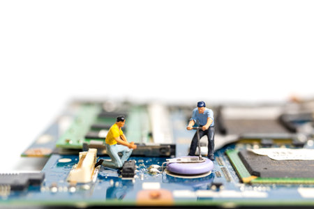 Miniature people working on cpu board, Technology concept