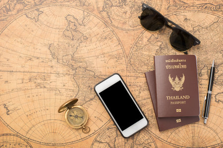 Planning travel concept, Thailand passport on old map