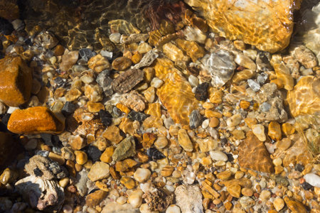 colorful pebbles under water sea for the background