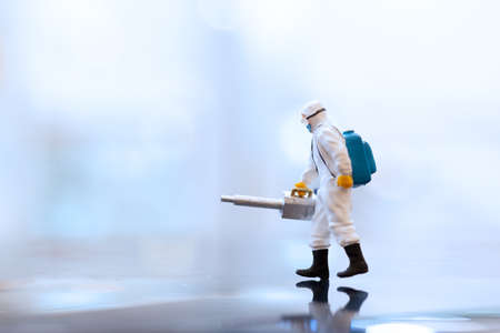 Miniature people Doctor wearing face-masks during virus and flu outbreak.の写真素材