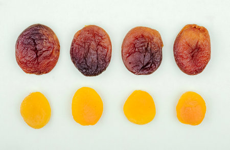 top view of dried apricots isolated on white background