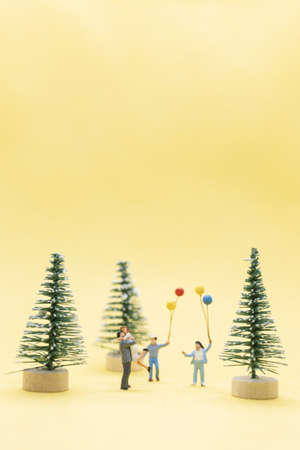Miniature people, Happy family celebrating A Christmas