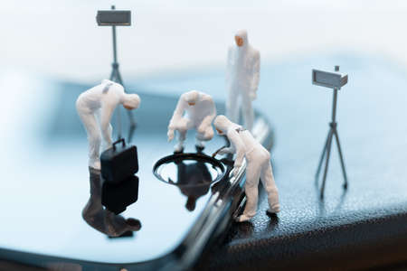 Police And Detective are working on smartphone , Cyber crimes conceptの写真素材