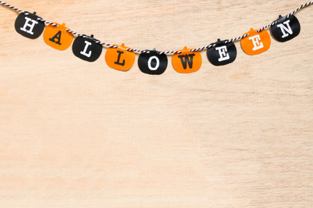 Halloween flags , black and orange flags on wooden backgroundの写真素材