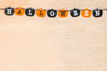 Halloween flags , black and orange flags on wooden background