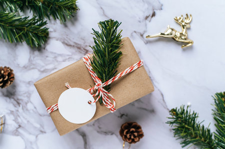 Gift boxes with small gifts on white cement