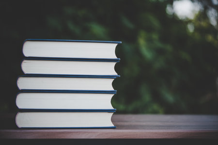 book stack background table wooden outdoorの写真素材