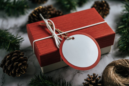 Gift boxes with small gifts on white cement