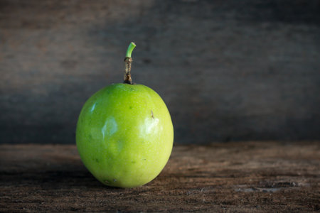 Passion fruit on wood background , Healthy fruitの写真素材
