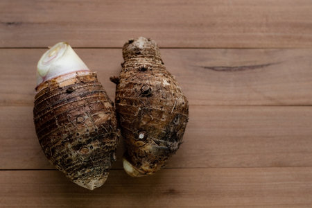 Taro on table wood background.の写真素材