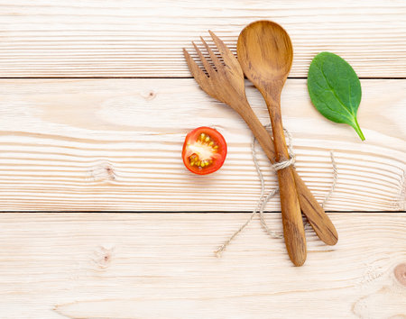Food background and salad concept with raw ingredients flat lay on white wooden background.の写真素材