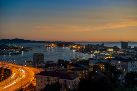 Urban landscape with a view of the Golden Bridge. Vladivostok, Russiaの写真素材