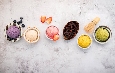 Various of ice cream flavours in bowl blueberry ,green tea ,coconut ,strawberry and chocolate setup...