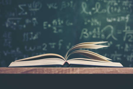 Open book with green board background
