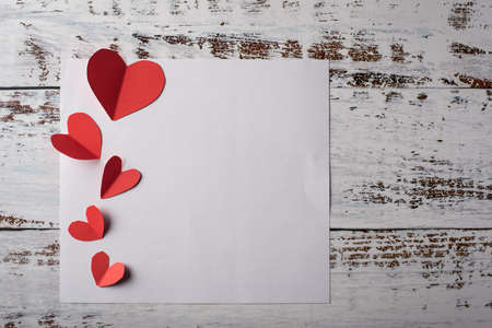 Top view Red heart on wood background