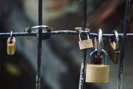 padlock on the fenceの写真素材