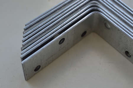Metal fastening of wooden building structures