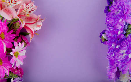 top view of pink white and purple color statice alstroemeria and chrysanthemum flowers on lilac...