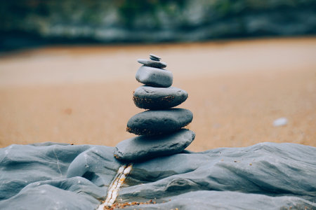 stone balancing on the beachの写真素材