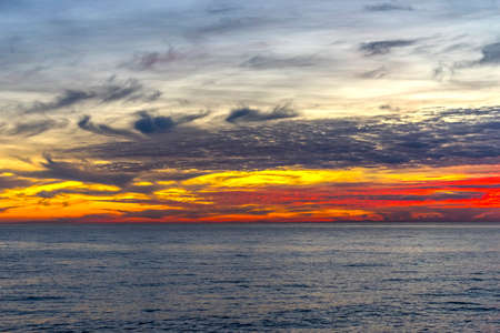 landscape from a height overlooking the sea and a bright sunset.の写真素材