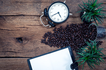 Work desks, notebooks, stationery and coffee are above viewの素材