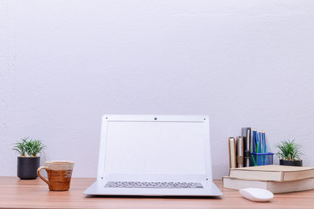 notebook computer was placed at the desk in the roomの素材