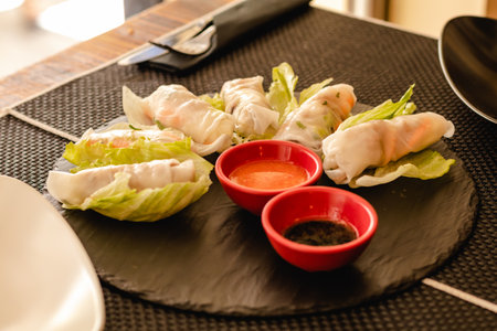 Vietnamese rolls with vegetables, served on restaurantの素材