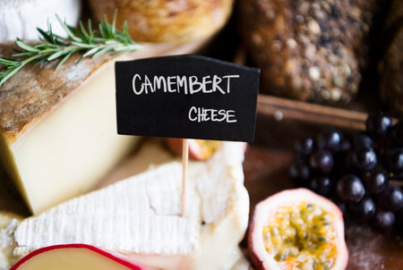 Delicatessen shop selling cheese of many sortsの素材