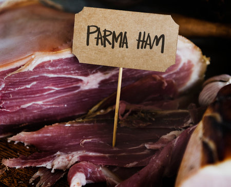 Parma ham on a wooden tableの素材