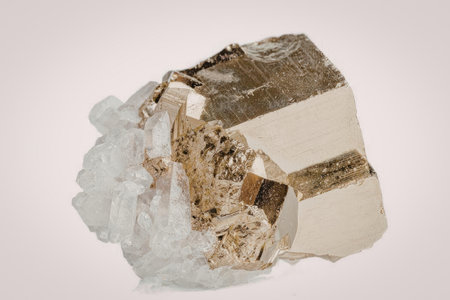 A large gold nugget with quartz, showcasing its natural crystalline structure and metallic luster.