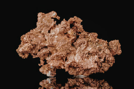 A large copper ore specimen with a rough, irregular shape and a reddish-orange color, set against a...