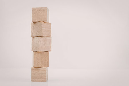 A stack of wooden blocks on a white background