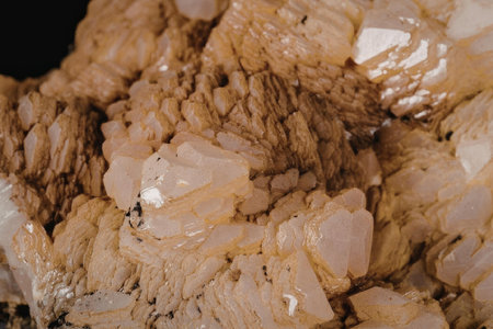 A detailed view of a brown crystal formation showcasing its unique texture and structure.