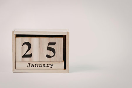 A wooden perpetual calendar displaying the date January 25.の写真素材